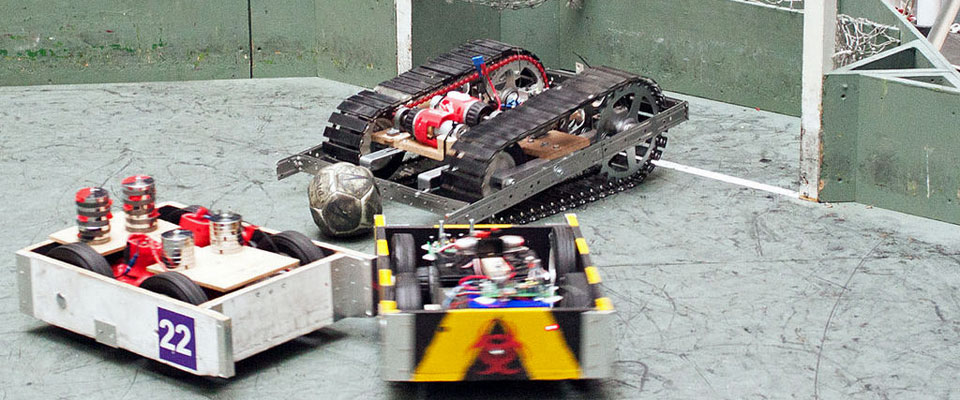 Robots compete in the Rampaging Chariots football tournament