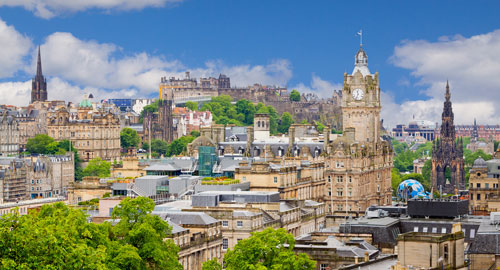 The sun shining on the city of Edinburgh