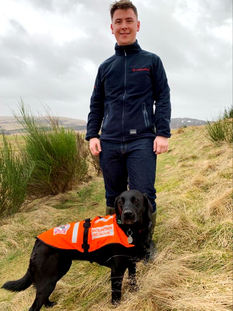 Ross Pringle with his mountain rescue dog, Evie