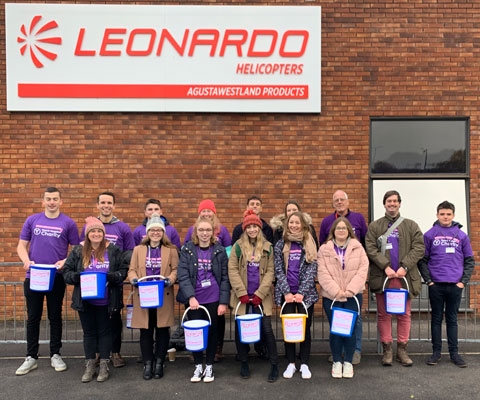 Leonardo Helicopters apprentices and graduates with their fundraising buckets in aid of Yeovil Hospital Charity