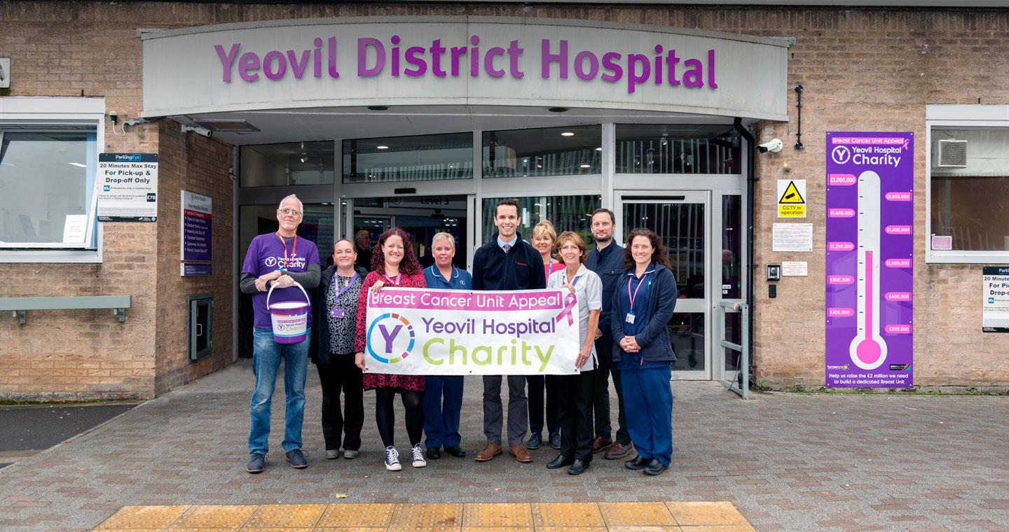 Leonardo Helicopters fundraisers stand proudly with members of the Yeovil Hospital Charity
