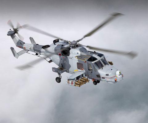 Royal Navy AW159 Wildcat flying and armed with the Martlet missiles