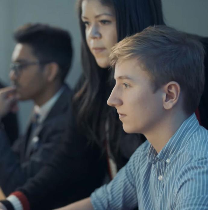 Young cyber security engineers (still from Unlock Cyber video)
