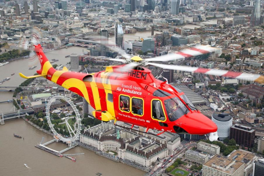 Essex & Herts Air Ambulance AW169 flies over the central London