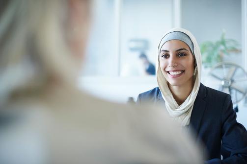 Businesswoman smiling during a meeting