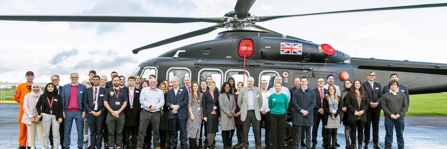 Team AW149 UK supply chain members at Yeovil in front of an AW149
