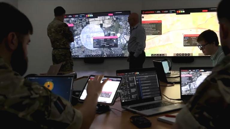 Falcon Shield equipment on a bright background that includes airport imagery