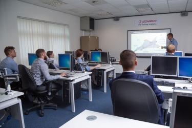 Leonardo trainer presenting on electronic warfare countermeasures at the company