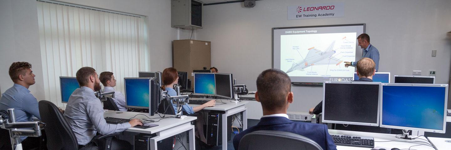 Leonardo trainer presenting on electronic warfare countermeasures at the company
