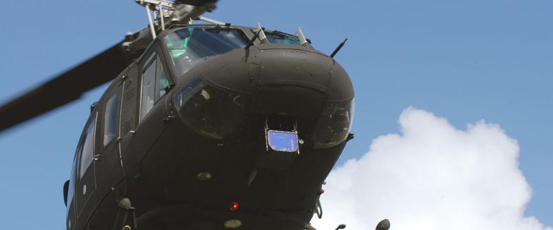 Underside of helicopter showing avionics device attached
