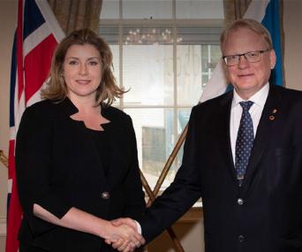 UK Defence Secretary Penny Mordaunt and her Swedish counterpart Peter Hultqvist shaking hands